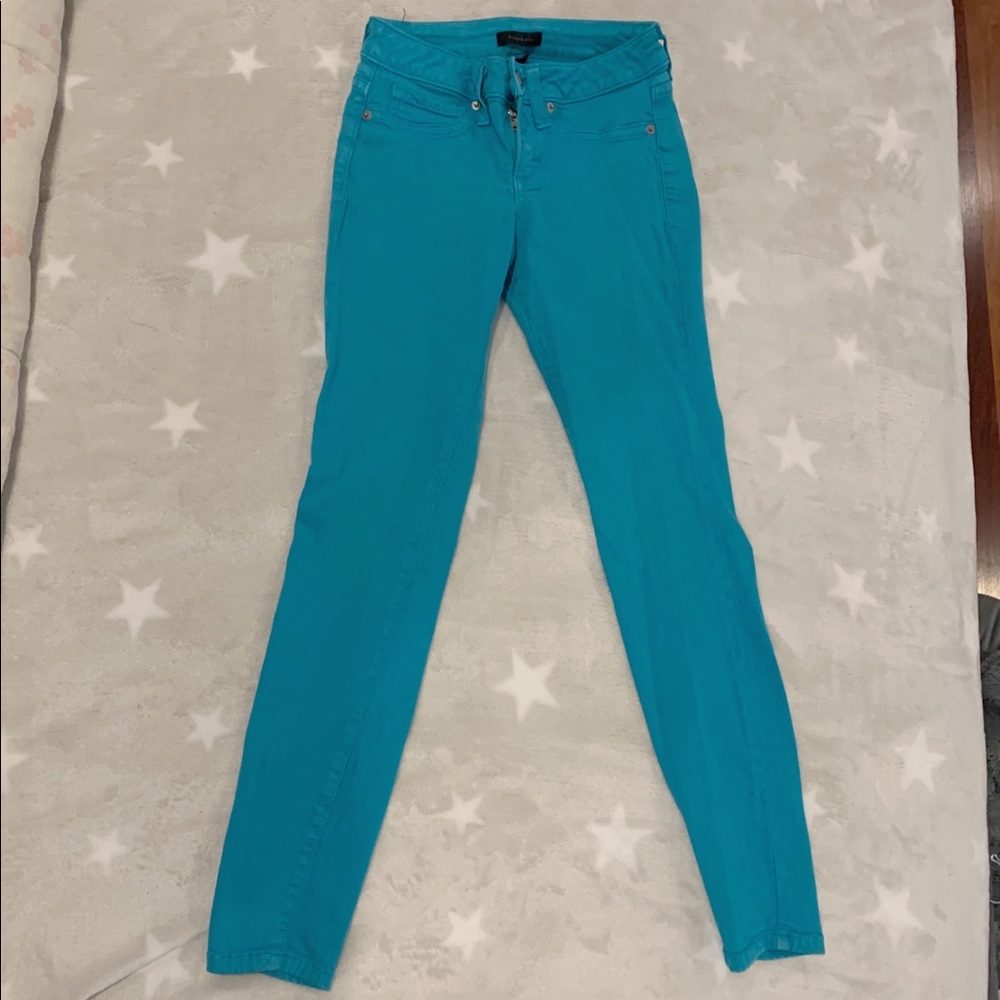 Light Blue Bebe Low Rise Skinny Jeans